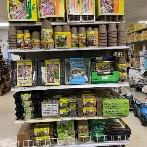 Lawn and garden supplies displayed inside of B'Ville Supply.