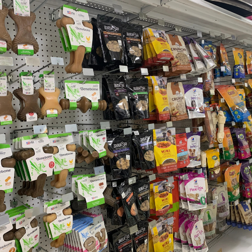 Dog food and supplies displayed inside of B'Ville Supply.