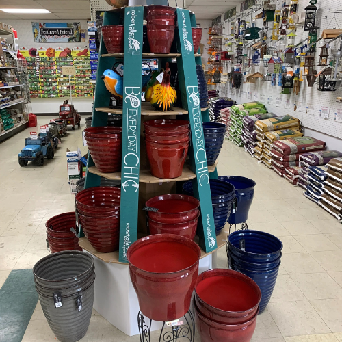 Lawn and garden supplies displayed inside of B'Ville Supply.