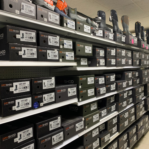 Footwear and supplies on display inside o B'Ville Supply.